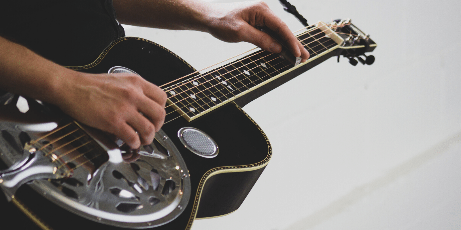 Picture of a Dobro: Who Plays It? Famous Musicians and Their Instruments!
