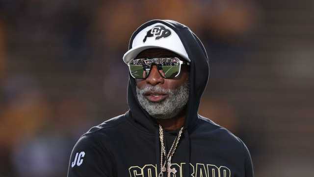What style are the official Dion Sanders sunglasses? Discover his signature eyewear choices right now.