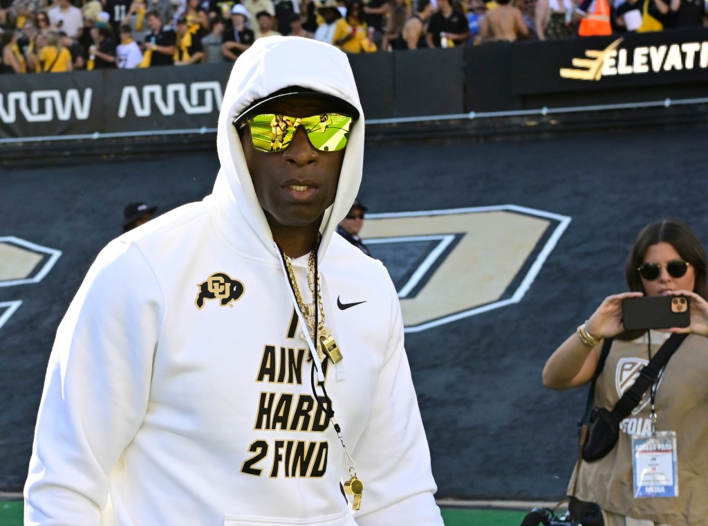 What style are the official Dion Sanders sunglasses? Discover his signature eyewear choices right now.
