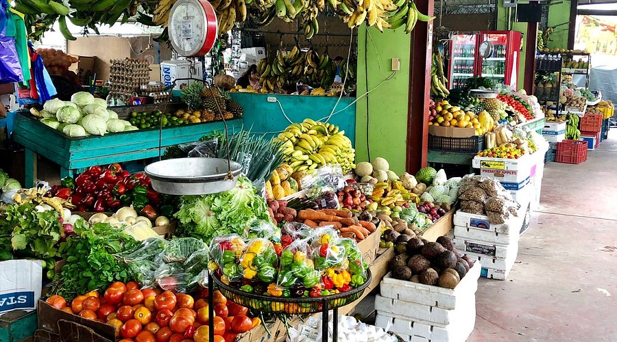 Eating at San Ignacio Market Belize best local snacks and street food you must try